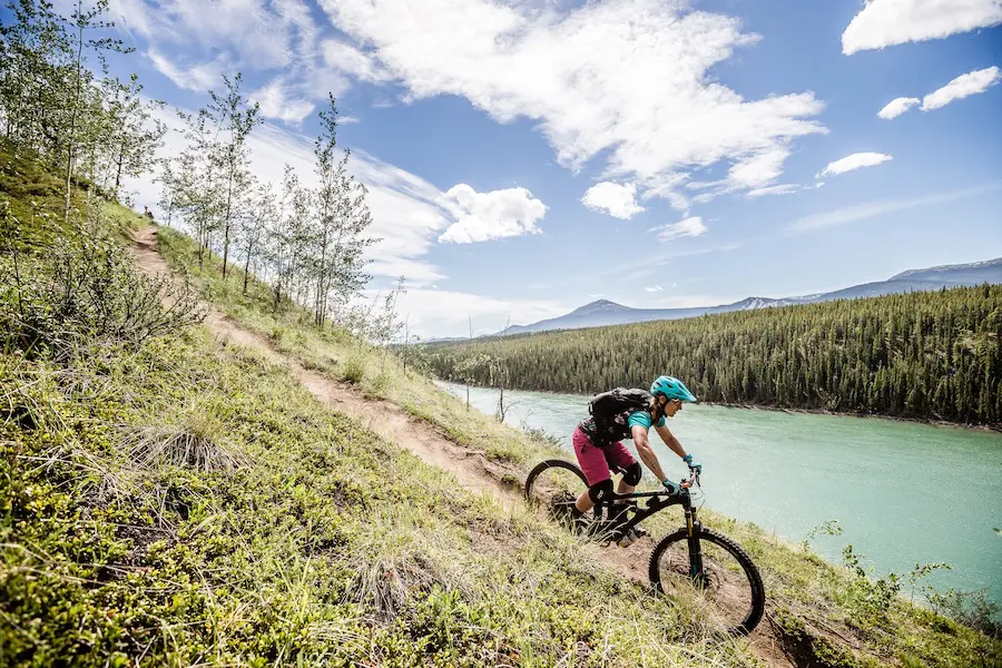 Female mountain biker in the Yukon, Canada