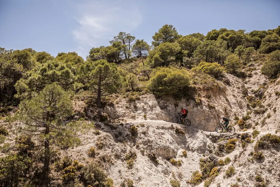 Male and female e-mountain bikers in the Andalucia, Spain