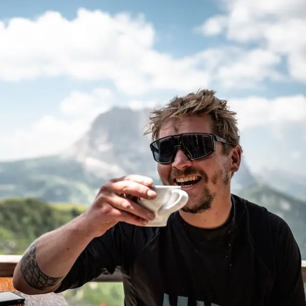 Local guide in the Dolomites Alberto Valeruz drinking coffee