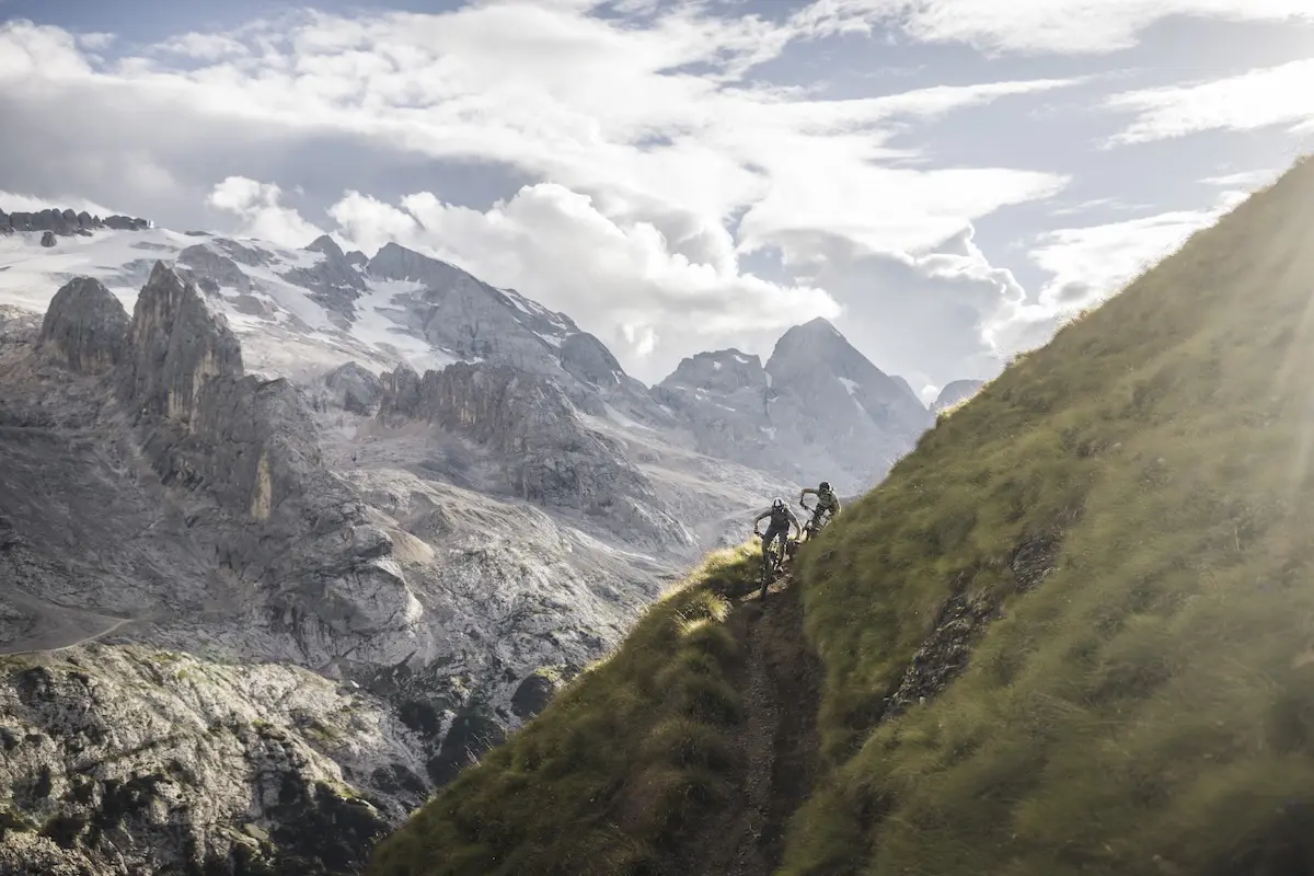 Two mountain bikers in the Dolomites, Italy