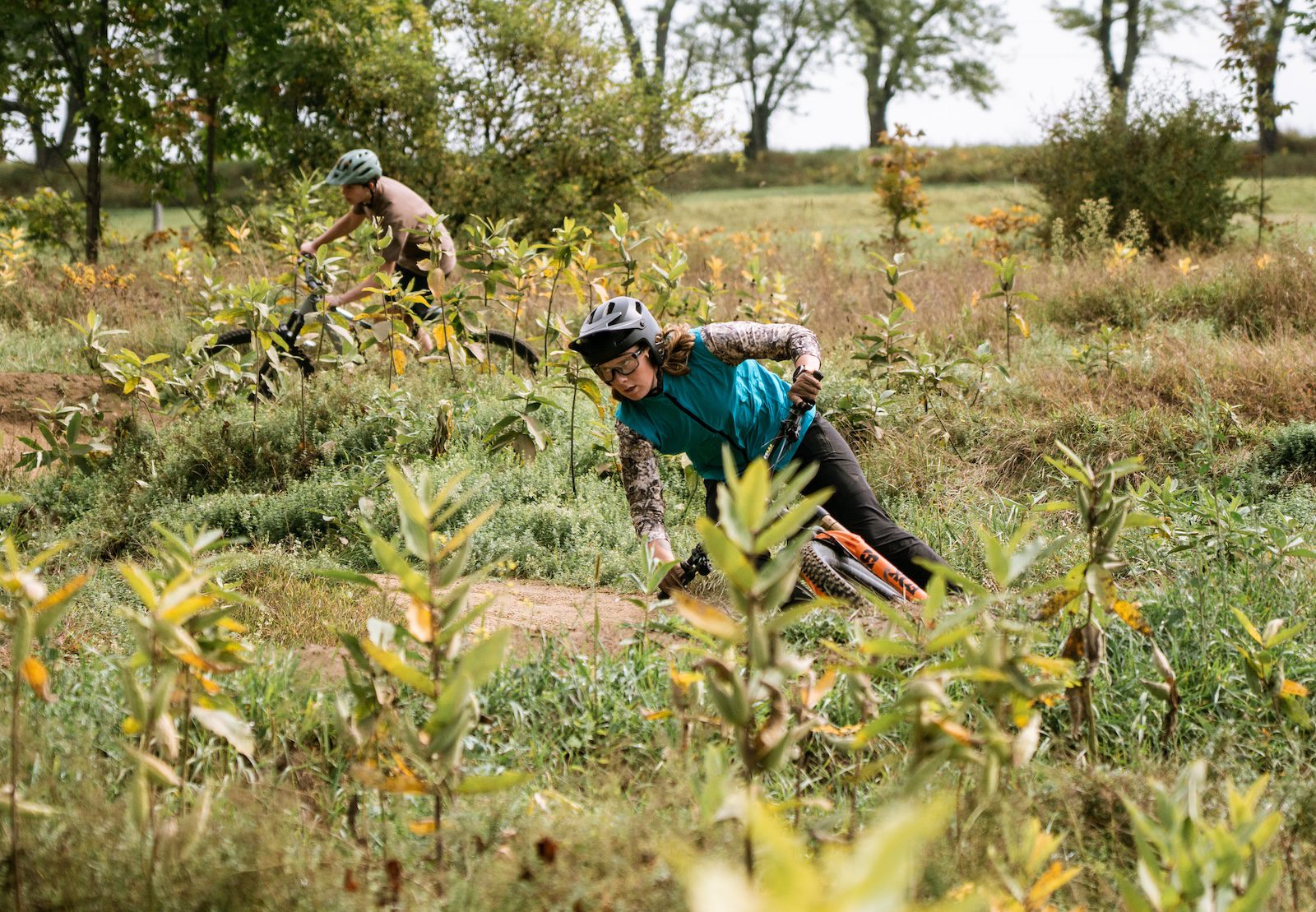 Leah riding a berm at Yeti gathering