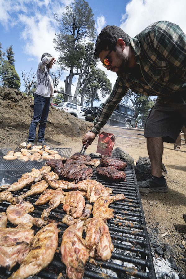 Cooking a traditional asado with locals in Chile, travel guide